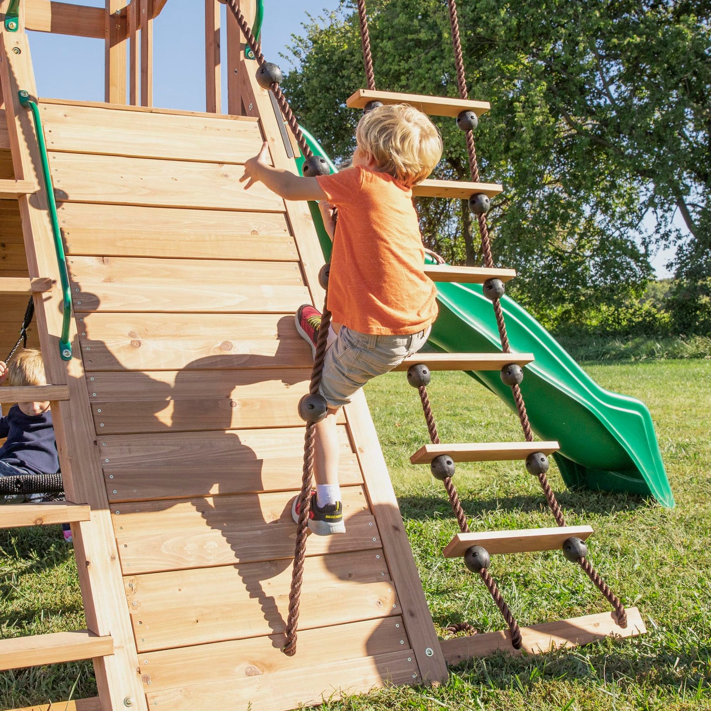 Backyard Discovery Endeavor All Cedar Wood Swing Set Playset for Backyard with Large Clubhouse Wave Slide Rope Ladder Rock Climbing Wall Wave Slide 2 Belt Swings and 1 Web Swing Gift for Ages 3-10