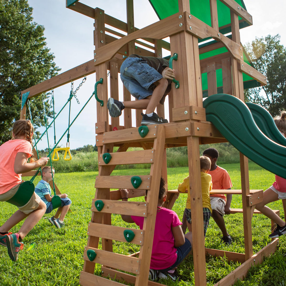 Backyard Discovery Belmont Cedar Wood Swing Set with Wave Slide, Play Deck, Rock Wall Ladder, Snack Bar Window, Shaded Picnic Area, Bench, Belt Swings, Trapeze, Sandbox Area, Canopy, Outdoor Playset