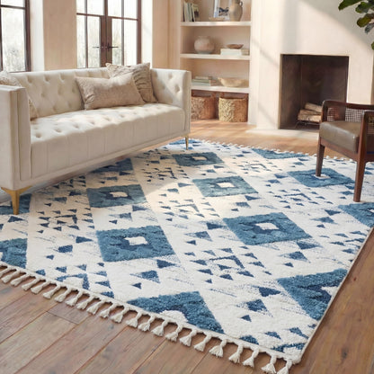 SAFAVIEH Area Rug 8x10 - Moroccan Tassel Shag Collection - Large - Blue & Ivory, Non-Shedding & Easy to Clean, Plush High-Low Texture, Ideal for Living Room, Bedroom, Dining Space (MTS688M)