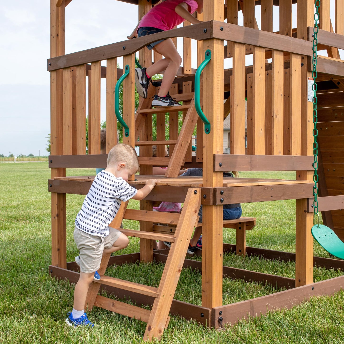 Backyard Discovery Highlander Cedar Wood Swing Set with Wave Slide, Three-Story Clubhouse, Rock Wall, Picnic Table, Belt Swings, Web Swing, Sandbox, Three Ladders, Toy Accessories, Outdoor Playset
