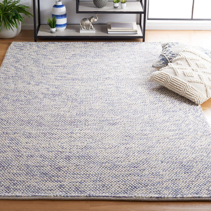SAFAVIEH Natura Collection Area Rug - 6' x 9', Blue & Ivory, Handmade Wool, Ideal for High Traffic Areas in Living Room, Bedroom (NAT182M)
