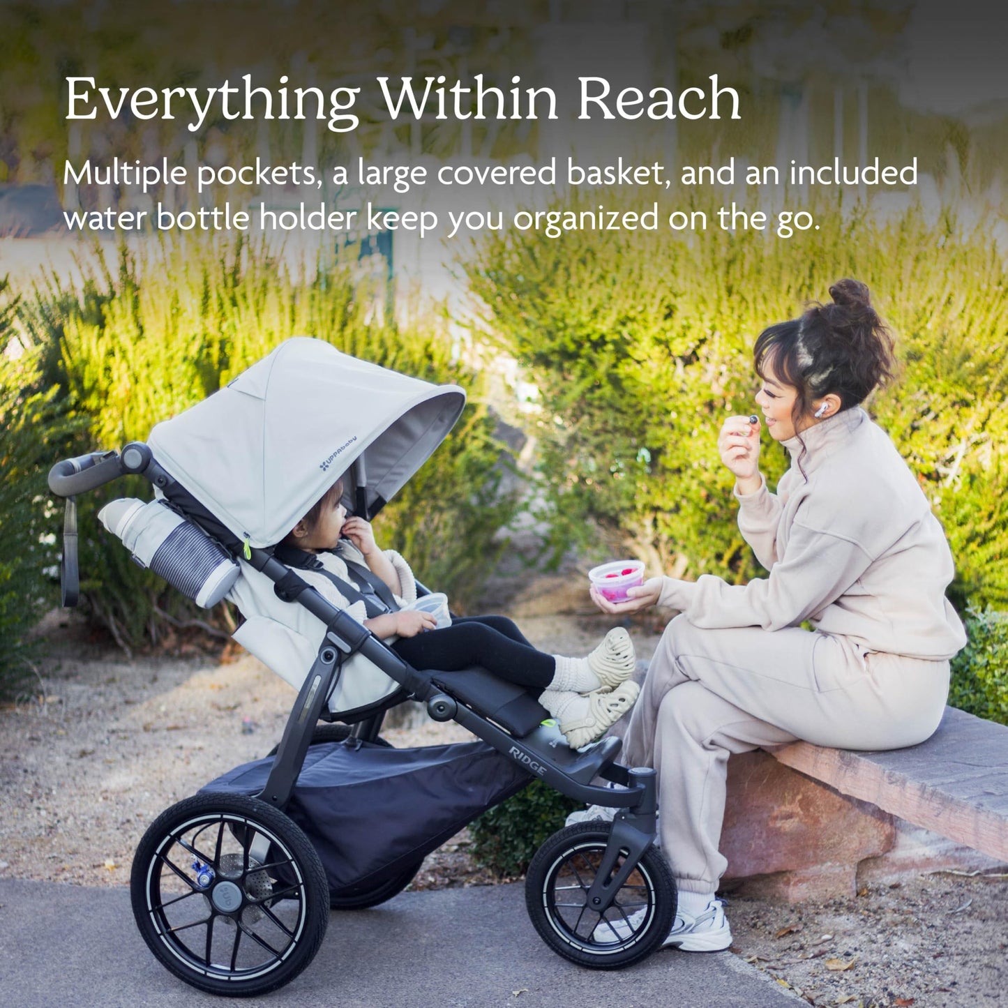 UPPAbaby Ridge V2 Jogging Stroller | All-Terrain Performance Suspension + Never-Flat Tires Built for Walking, Running + Trails | Water Bottle Holder Included | Evelyn (Meadow Green | Carbon Frame)