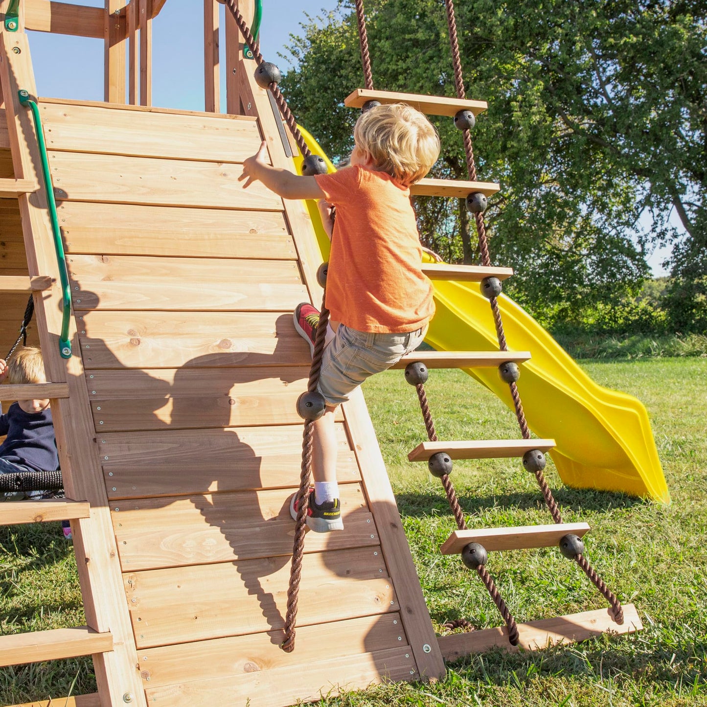 Backyard Discovery Endeavor Cedar Wood Swing Set with Wave Slide, Play Deck, Double Rock Wall, Rope Ladder, Climbing Wall, Belt Swings, 40-Inch Web Swing, Step Ladder, Toy Telescope, Outdoor Playset