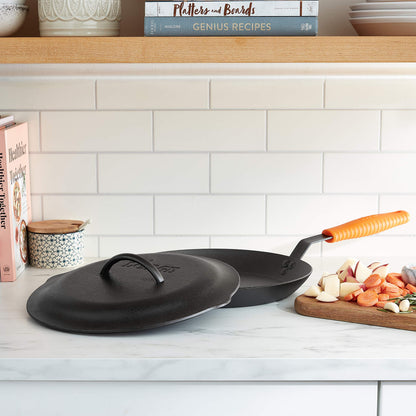 Lodge 12 Inch Cast Iron Lid. Classic 12-Inch Cast Iron Cover Lid with Handle and Interior Basting Tips.