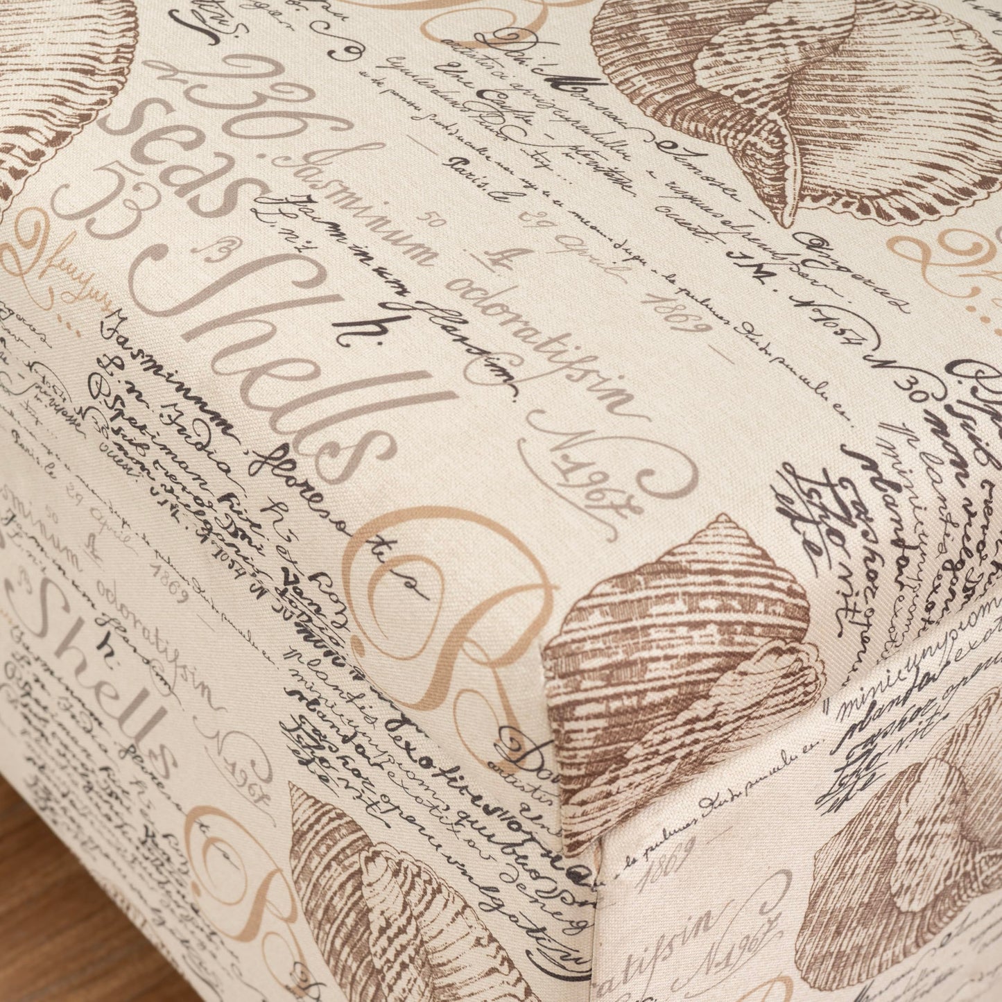 Linon Carmen Ivory and Beige Seashell Upholstered Lift Top Storage Ottoman with Wooden Feet