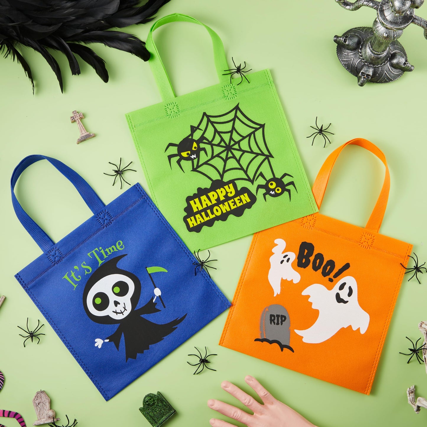 JOYIN 24PCS Halloween Non-Woven Treat Bags, 8.6" Goodie Totes Bags with Handles, Halloween Candy Bag for Kids Trick or Treating, 6 Cute Designs Gifts Goody Bag Bulk for Classroom Party Favor Supplies