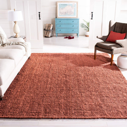 SAFAVIEH Area Rug 8x10 - Natural Fiber Collection - Large - Rust, Handmade Jute, Farmhouse Style, Chunky Textured Thick Pile (NF447C)
