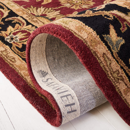 SAFAVIEH Heritage Collection Area Rug - 7'6" x 9'6", Red & Black, Handmade Traditional Oriental Wool, Ideal for High Traffic Areas in Living Room, Bedroom (HG628C)