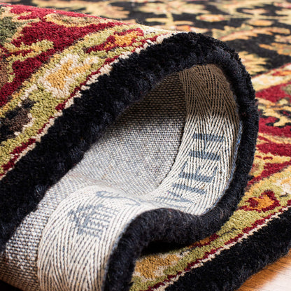 SAFAVIEH Heritage Collection Area Rug - 8' Round, Black & Red, Handmade Traditional Oriental Wool, Ideal for High Traffic Areas in Living Room, Bedroom (HG953A)
