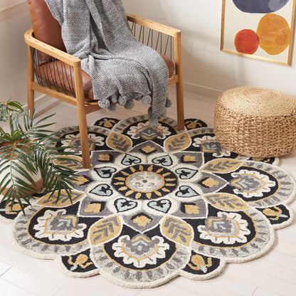 SAFAVIEH Novelty Collection Area Rug - 10' Round, Ivory & Black, Handmade Boho Floral Rustic Country Wool, Ideal for The Living Room, Dining Room, Bedroom (NOV604Z-10R)
