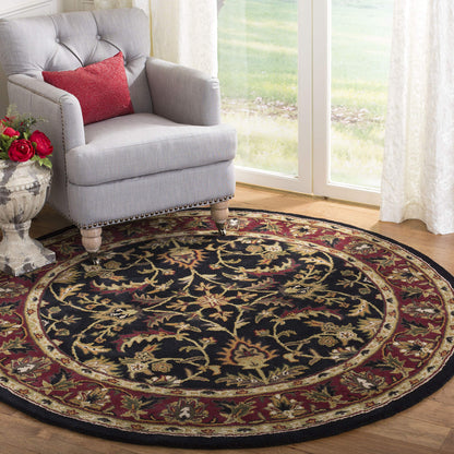 SAFAVIEH Heritage Collection Area Rug - 8' Round, Black & Red, Handmade Traditional Oriental Wool, Ideal for High Traffic Areas in Living Room, Bedroom (HG953A)