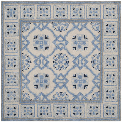 SAFAVIEH Bella Collection Area Rug - 7' Square, Ivory & Blue, Handmade Wool & Viscose, Ideal for High Traffic Areas in Living Room, Bedroom (BEL155A)