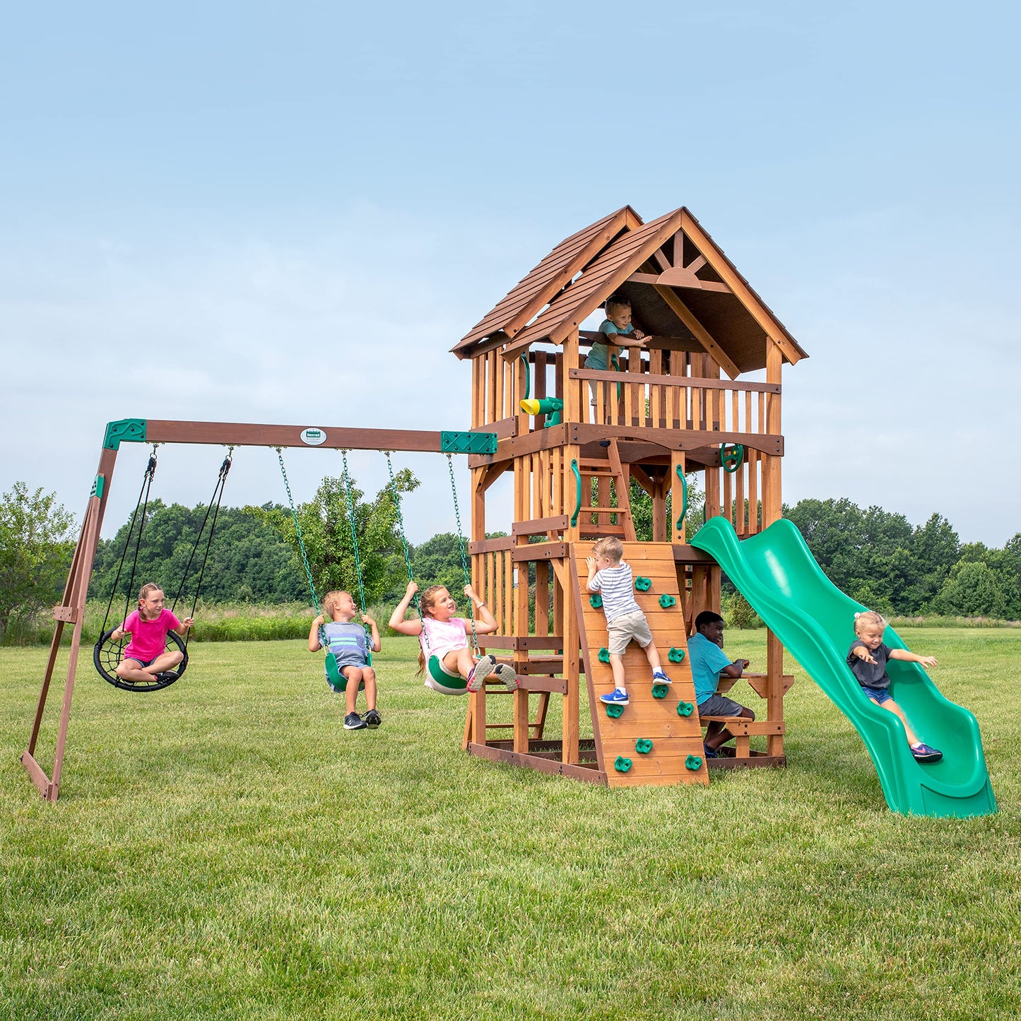 Backyard Discovery Highlander Cedar Wood Swing Set with Wave Slide, Three-Story Clubhouse, Rock Wall, Picnic Table, Belt Swings, Web Swing, Sandbox, Three Ladders, Toy Accessories, Outdoor Playset