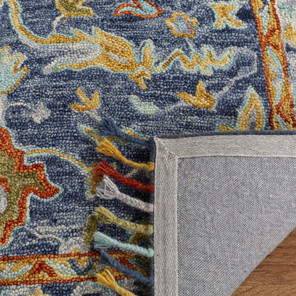 SAFAVIEH Aspen Collection Area Rug - 9' x 12', Blue & Rust, Handmade Boho Braided Tassel Wool, Ideal for High Traffic Areas in Living Room, Bedroom (APN116M)