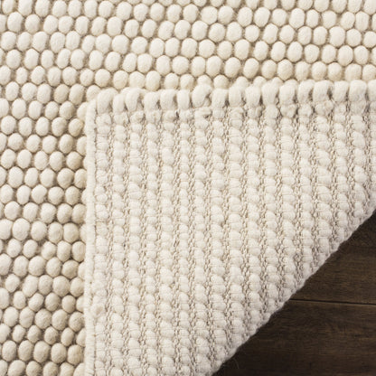 SAFAVIEH Area Rug 6x9 - Natura Collection - Ivory, Handmade Wool Blend, Textured Design, Ideal for Living Room, Bedroom, Dining Space (NAT620A)