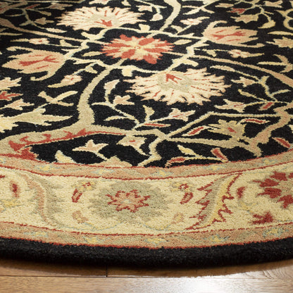 SAFAVIEH Antiquity Collection Area Rug - 7'6" x 9'6" Oval, Black, Handmade Traditional Oriental Wool, Ideal for High Traffic Areas in Living Room, Bedroom (AT14B)