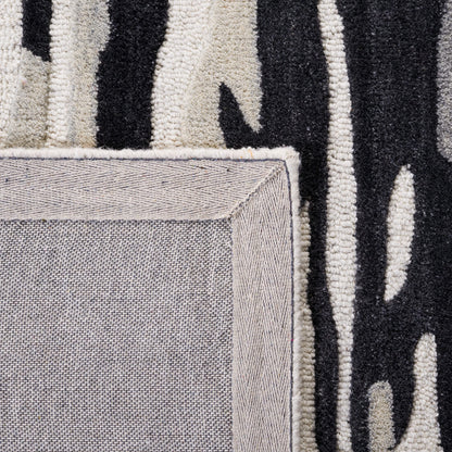 SAFAVIEH Area Rug 8x10 - Rodeo Drive Collection - Large - Ivory & Black, Handmade Wool, Mid-Century Modern Design, Ideal for Living Room, Bedroom, Office, Dining Space (RD858Z)