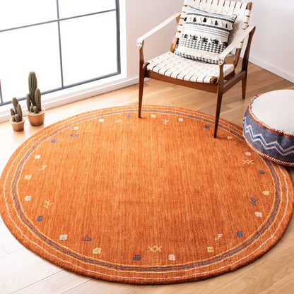 SAFAVIEH Himalaya Collection Area Rug - 8' Round, Rust, Handmade Boho Tribal Wool, Ideal for High Traffic Areas in Living Room, Bedroom (HIM563P)