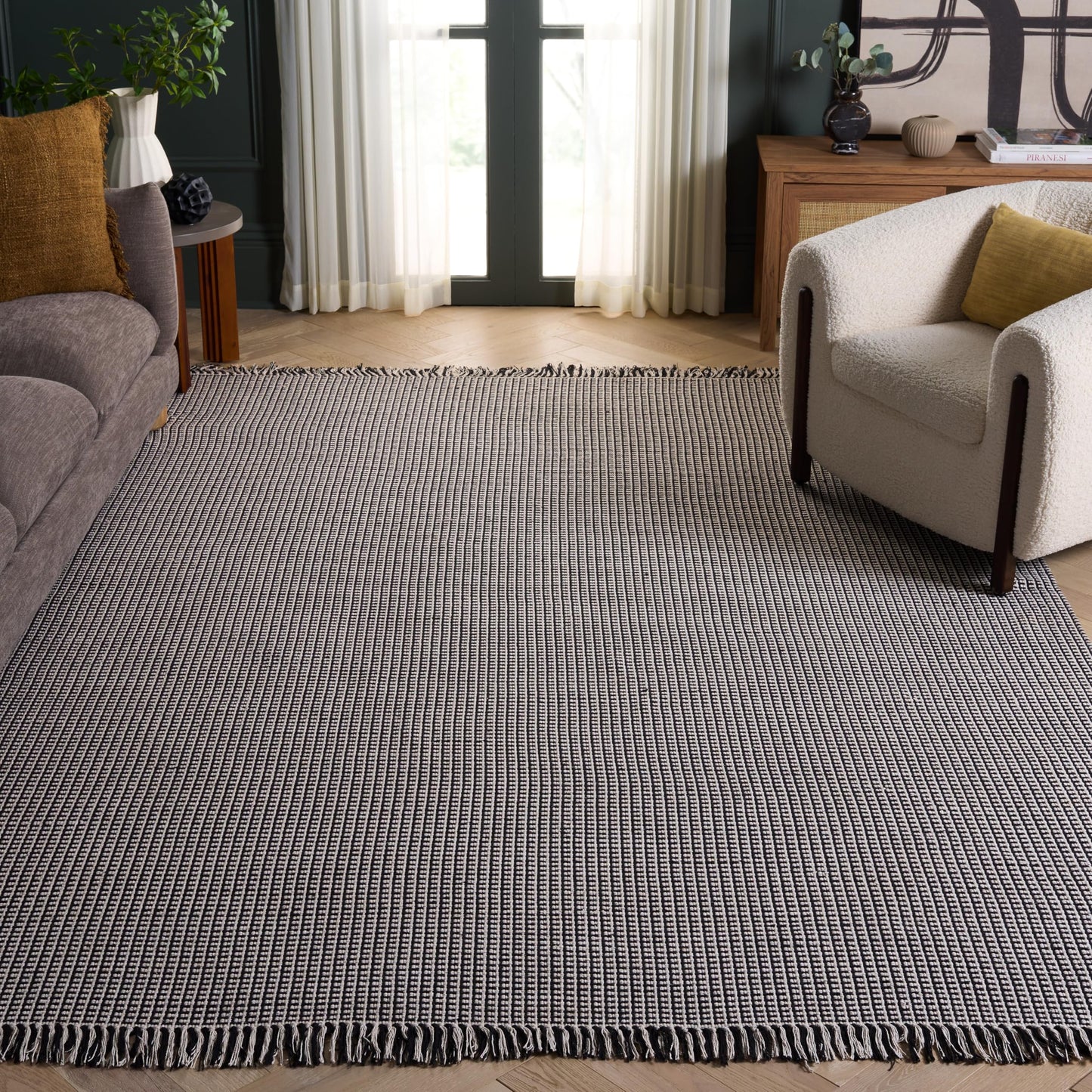 SAFAVIEH Montauk Collection Area Rug - 9' x 12', Ivory & Black, Handmade Flat Weave Boho Farmhouse Cotton Tassel Fringe, Ideal for High Traffic Areas in Living Room, Bedroom (MTK340D)