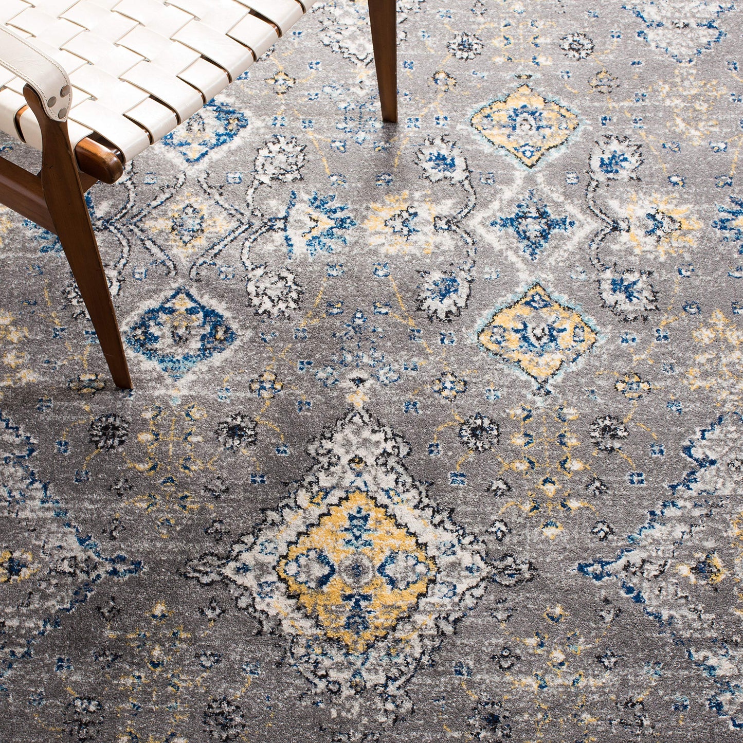 SAFAVIEH Evoke Collection Area Rug - 10' x 14', Dark Grey & Yellow, Boho Oriental Design, Non-Shedding & Easy Care, Ideal for High Traffic Areas in Living Room, Bedroom (EVK224G)