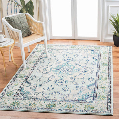 SAFAVIEH Monaco Collection Area Rug - 9' x 12', Light Blue & Ivory, Non-Shedding & Easy to Clean, Distressed Medallion Design, Ideal for Living Room, Bedroom, Dining Space (MNC243K)