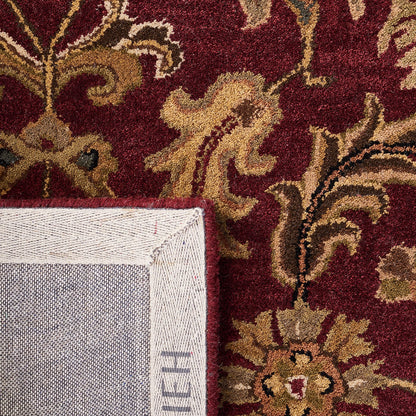 SAFAVIEH Heritage Collection Area Rug - 7'6" x 9'6", Red & Black, Handmade Traditional Oriental Wool, Ideal for High Traffic Areas in Living Room, Bedroom (HG628C)